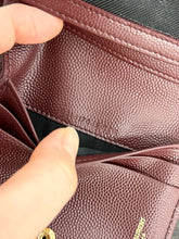 Load image into Gallery viewer, SAINT LAURENT Cassandre Matelasse Embossed Leather Bi-Fold Wallet in Burgundy