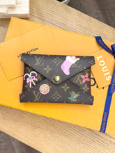 Load image into Gallery viewer, LOUIS VUITTON 2024 Limited Edition Monogram Kirigami Pochette Medium Pouch
